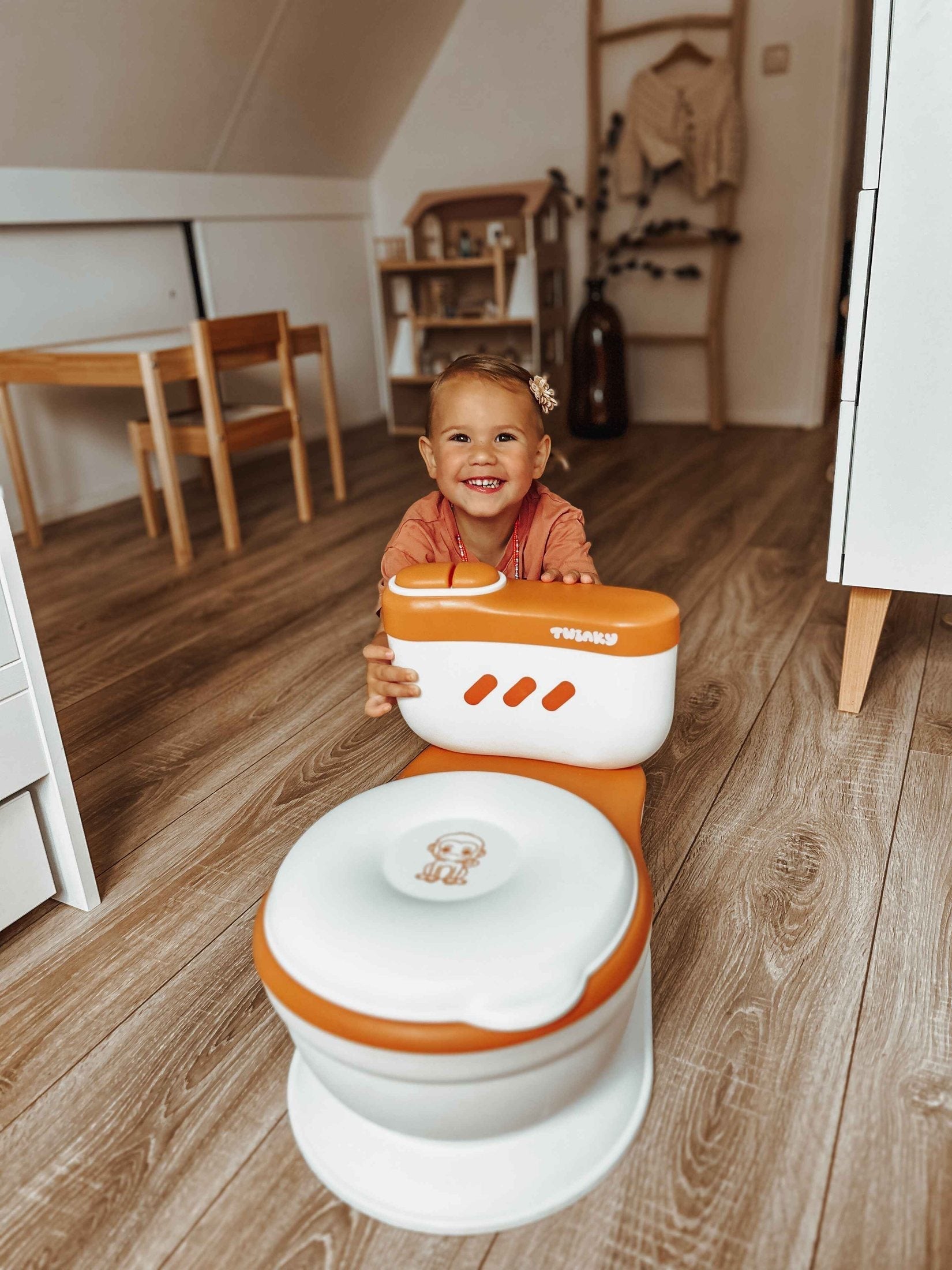 Entrenador para Ir al Baño Divertido y Compacto con Sonido de Descarga - Ideal para Aprendizaje Rápido, Fácil de Limpiar y Transportar 4